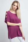 Woman’s short dolman sleeve top with lattice detail