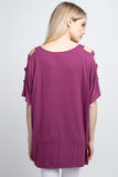 Woman’s short dolman sleeve top with lattice detail