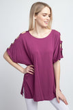 Woman’s short dolman sleeve top with lattice detail